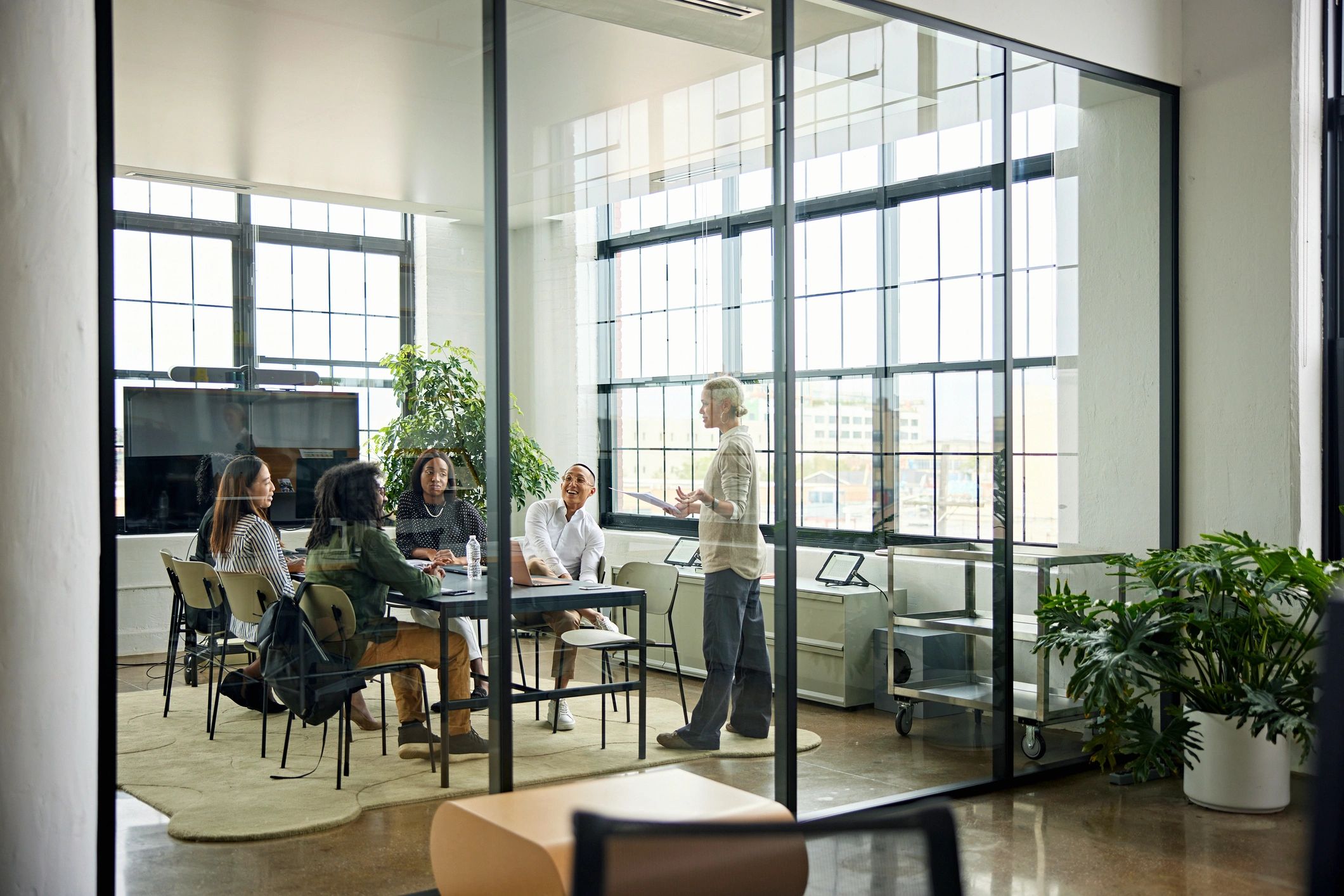 Energy consultants collaborating in a modern conference room